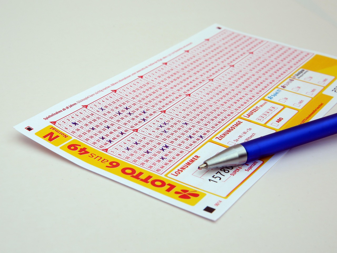 UK Lotto lottery balls numbers draw machine close up